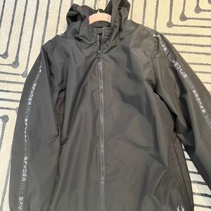 Rain/wind jacket with hoodie